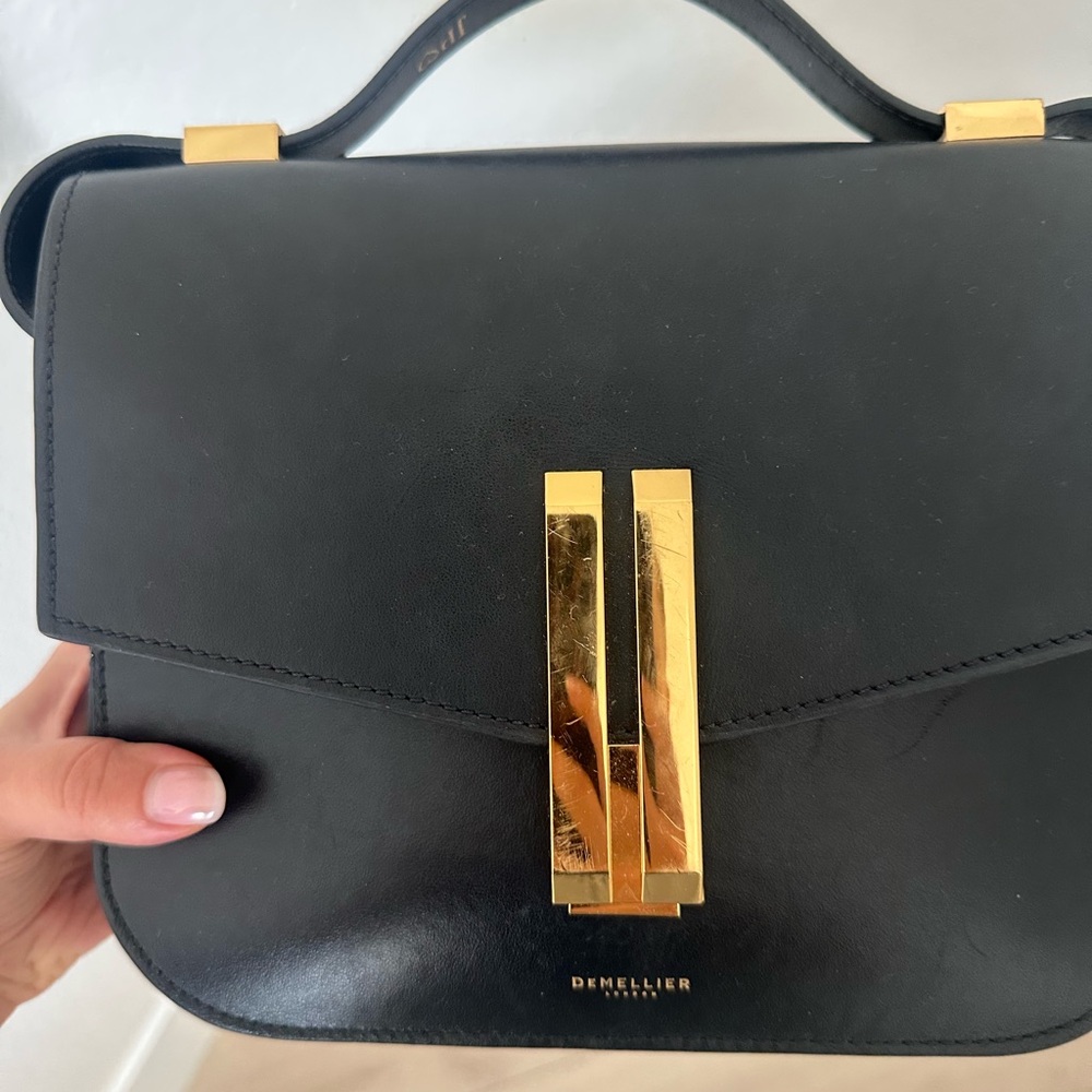 Black Leather Shoulder Bag with Gold Accents
